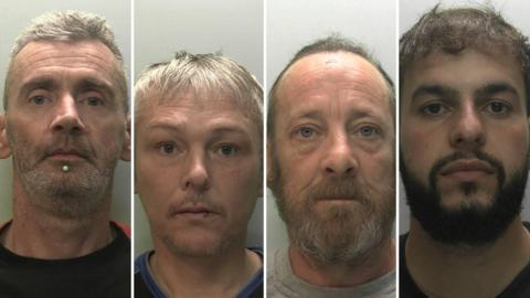 Mugshots of four men staring directly into the camera in front of an off white background. Cann has stubble and fair/grey short hair, Bailey has a moustache and light floppy hair, while Harkness has mousy brown hair, a beard and a receding hairline. Walid has a dark beard and hair.