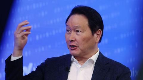 Chey Tae-won, chairman of SK Group, speaking during the company's initial public offering at the Nasdaq MarketSite in New York in July