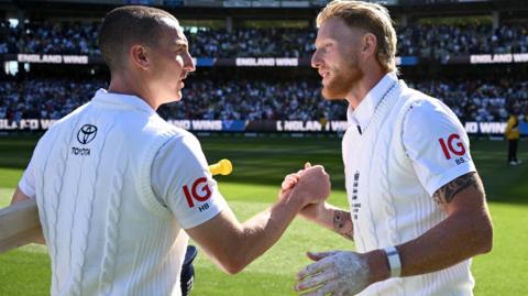 Harry Brook and Ben Stokes shake hands