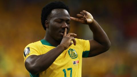 Australia's Nestory Irankunda celebrates scoring their first goal