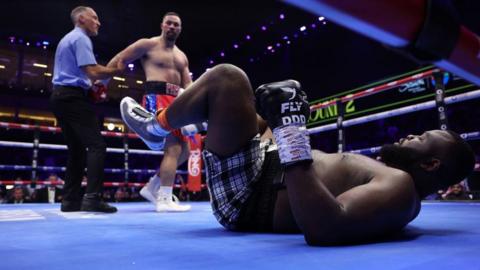 Joseph Parker stands over Martin Bakole