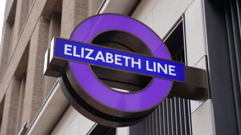 An Elizabeth line sign mounted on a wall