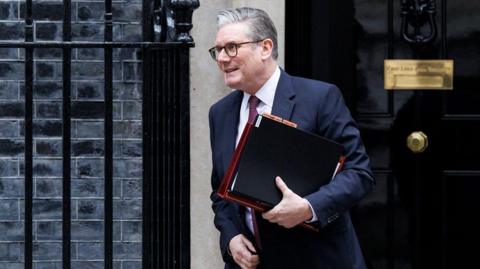 Prime Minister Keir Starmer departs his official residence at 10 Downing Street