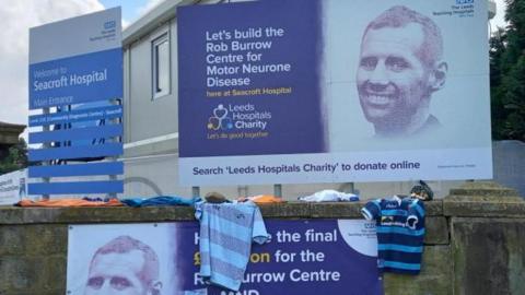 Signs promoting the campaign to build the Rob Burrow Centre for Motor Neurone Disease, at Seacroft Hospital in Leeds.