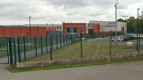 A photo of Park Academy from outside its school gates.