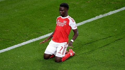 Bukayo Saka celebrates