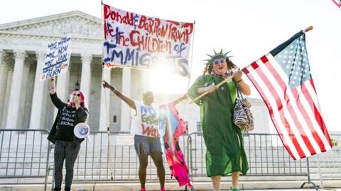 Protesters gather outside the Supreme Court