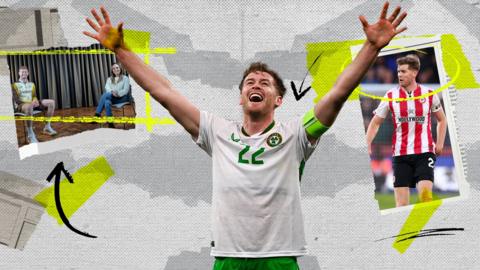 Nathan Collins celebrating success for Ireland with his arms in the air 
