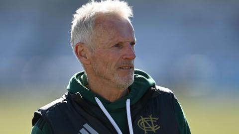 Peter Moores watches his Nottinghamshire players train