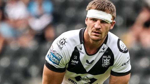 Jed Cartwright in action for Hull FC with a bandage around his head