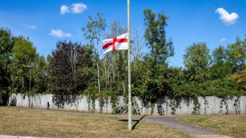 Generic image from Getty of an England Flag on a lamppost in Epsom, Surrey.