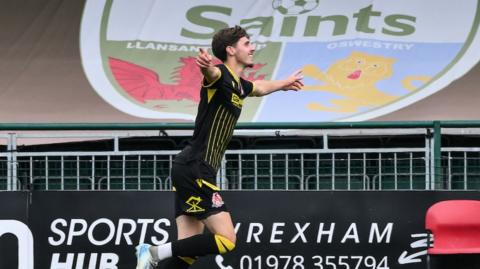 Briton Ferry's Ruben Davies celebrates