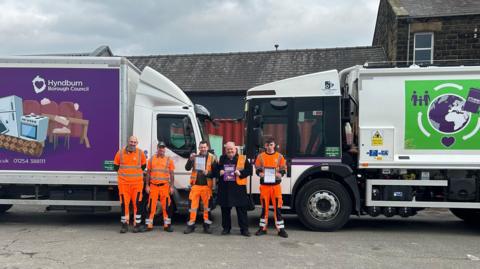 Councillor Stewart Eaves with Hyndburn Council Waste Services Officers and the new bin wagons