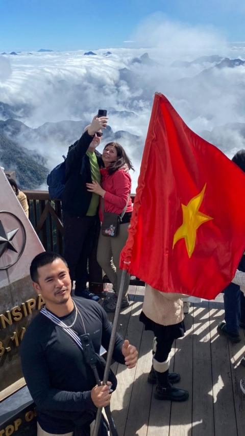 Ike holding a flag in his hand