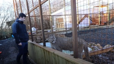 Reece Oliver and a lion