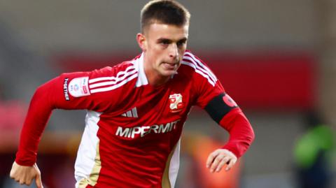 Adam Murphy in action for Swindon Town