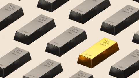 A treated image which shows rectangular pieces with the words "fine gold 999.9" written on them. One is illuminated in the colour gold while the rest are in black and white treatment.