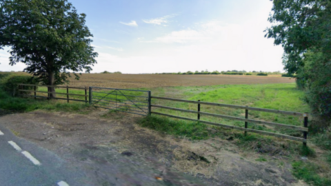 A field behind a fence