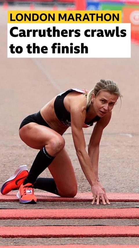Hayley Carruthers crawls on her knees crossing the London Marathon finish line 
