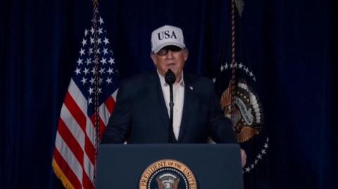 US President Donald Trump stood at a podium