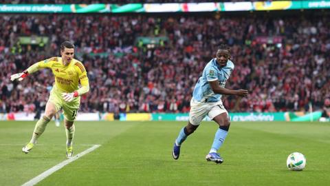 Arsenal goalkeeper Kepa Arrizabalaga rushes back into his area after fouling Jeremy Doku