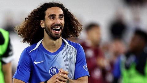 Marc Cucurella warming up for Chelsea 