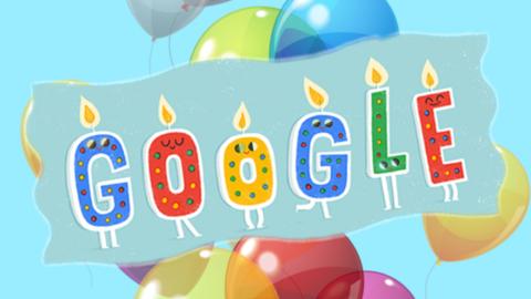 Google logo with candles and balloons