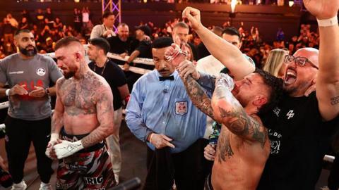 Liam Paro celebrates as the verdict is announced with Lewis Crocker disappointed
