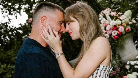 Travis Kelce and Taylor Swift embrace each other on the occassion of their engagement