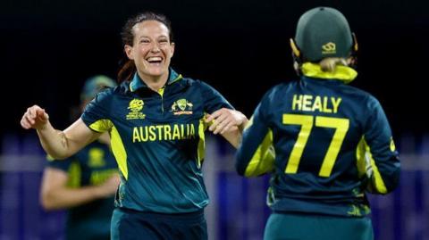 Australia bowler Megan Schutt celebrates taking a wicket