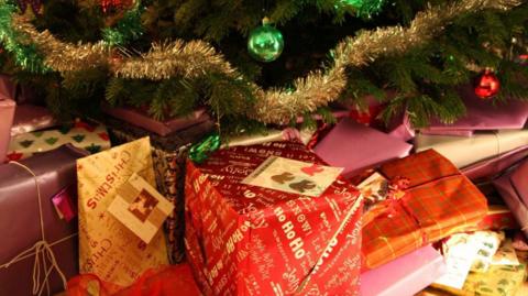 Presents under the Christmas tree on Christmas Eve.