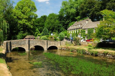 Cotswolds sand-coloured bridge on a sunny day