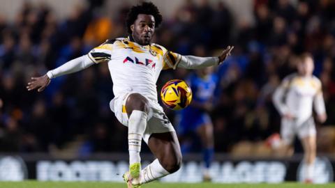 Geoffroy Bony looks to control the ball while playing for Newport