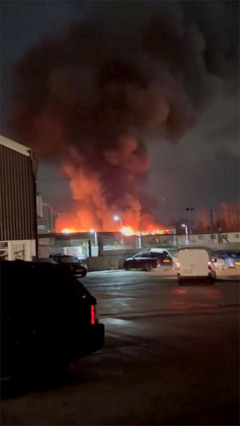 Smoke and flames seen above industrial site