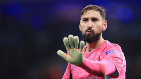 Gianluigi Donnarumma looks on