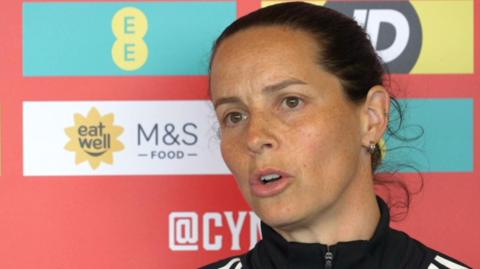 Rhian Wilkinson speaks to the media