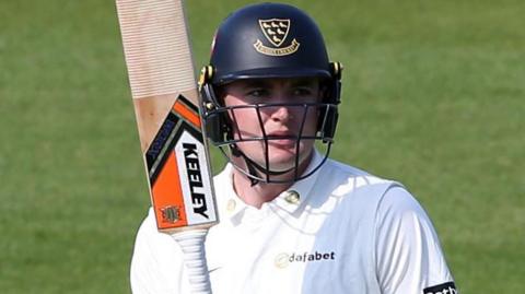 Jack Carson celebrates scoring fifty