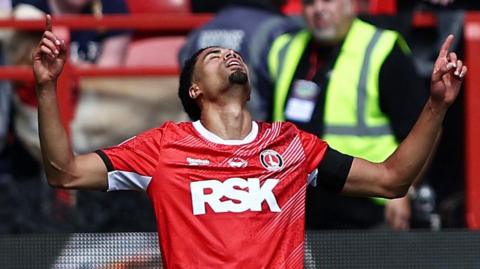 Harvey Knibbs celebrates scoring the winner