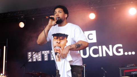 Cam Thomas on stage at the BBC Introducing stage at Big Weekend