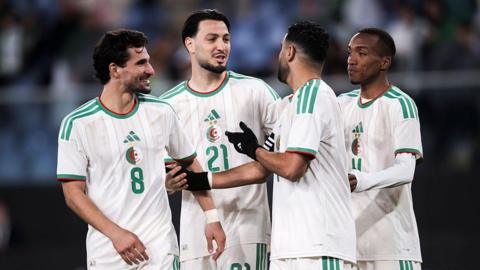 Houssem Aouar, Ramy Bensebaini, Riyad Mahrez and Achref Abada of Algeria celebrate during the friendly football match between Algeria and Guatemala