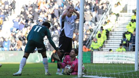 Lars-Jørgen Salvesen of Derby County shows dejection after being denied by Millwall goalkeeper Lukas Jensen