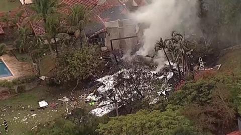 The scene after a plane crashed in Brazil