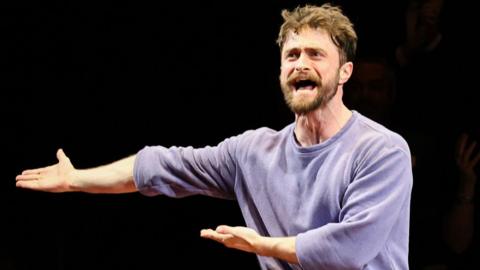 Daniel Radcliffe seen onstage during curtain call at "Every Brilliant Thing" Opening Night at Hudson Theatre on March 12, 2026 in New York City