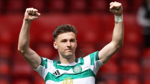 Kieran Tierney salutes Celtic supporters at Pittodrie on 10 August