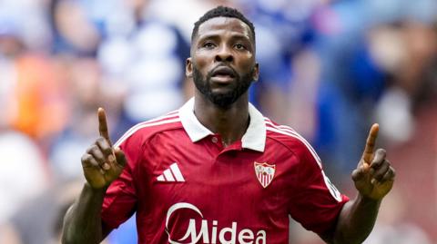 Kelechi Iheanacho celebrates with Sevilla