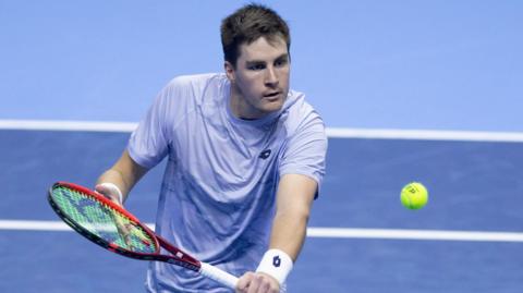 Henry Patten playing in the ATP Finals doubles in Italy