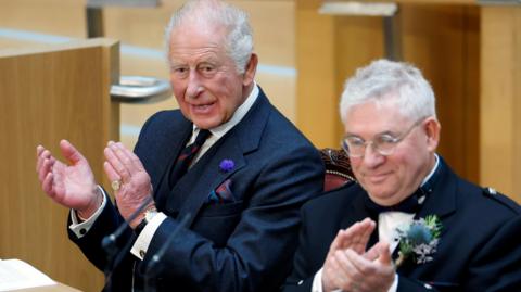 King Charles and Presiding Officer Kenneth Gibson applauding during the ceremony