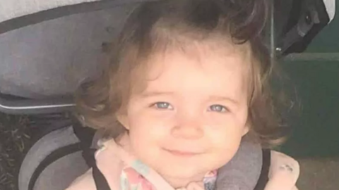 Head-and-shoulders image of Isabelle Rose Welsh. She is looking directly into the camera and has dark hair. She is wearing a pink top.