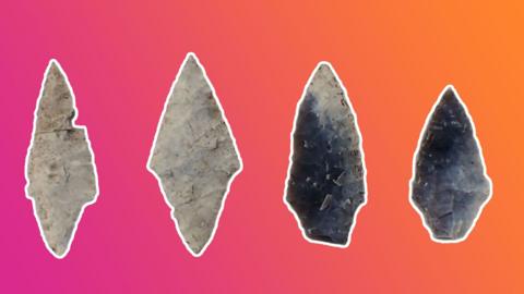 Four jagged pieces of stone, from a stone age burial site, on a pink and orange coloured background