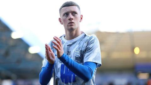 Birmingham City's Jay Stansfield applauds the fans during the pre-match warm-up